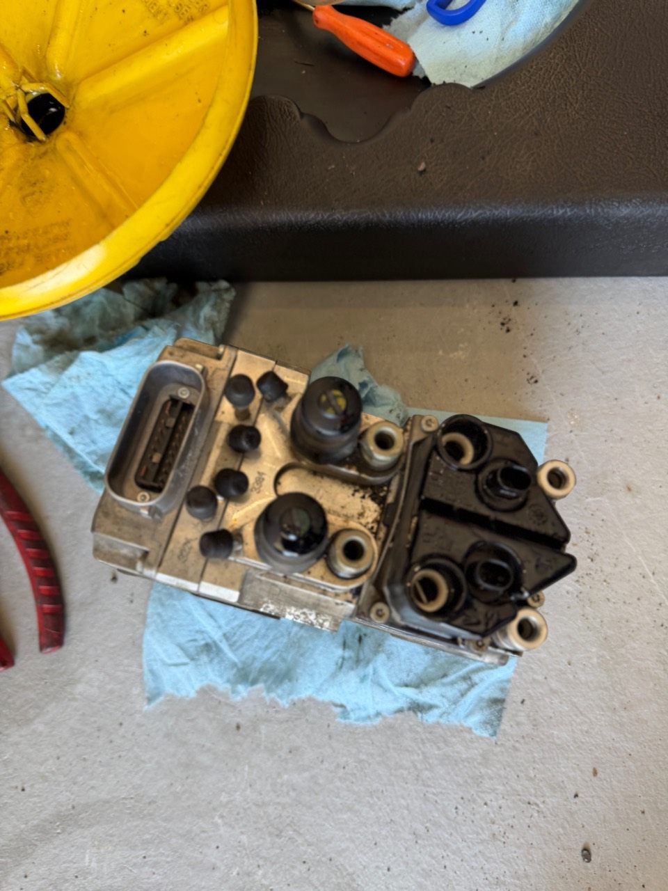 BMW R1200 servo-assisted iABS hydraulic modulator removed during bypass repair