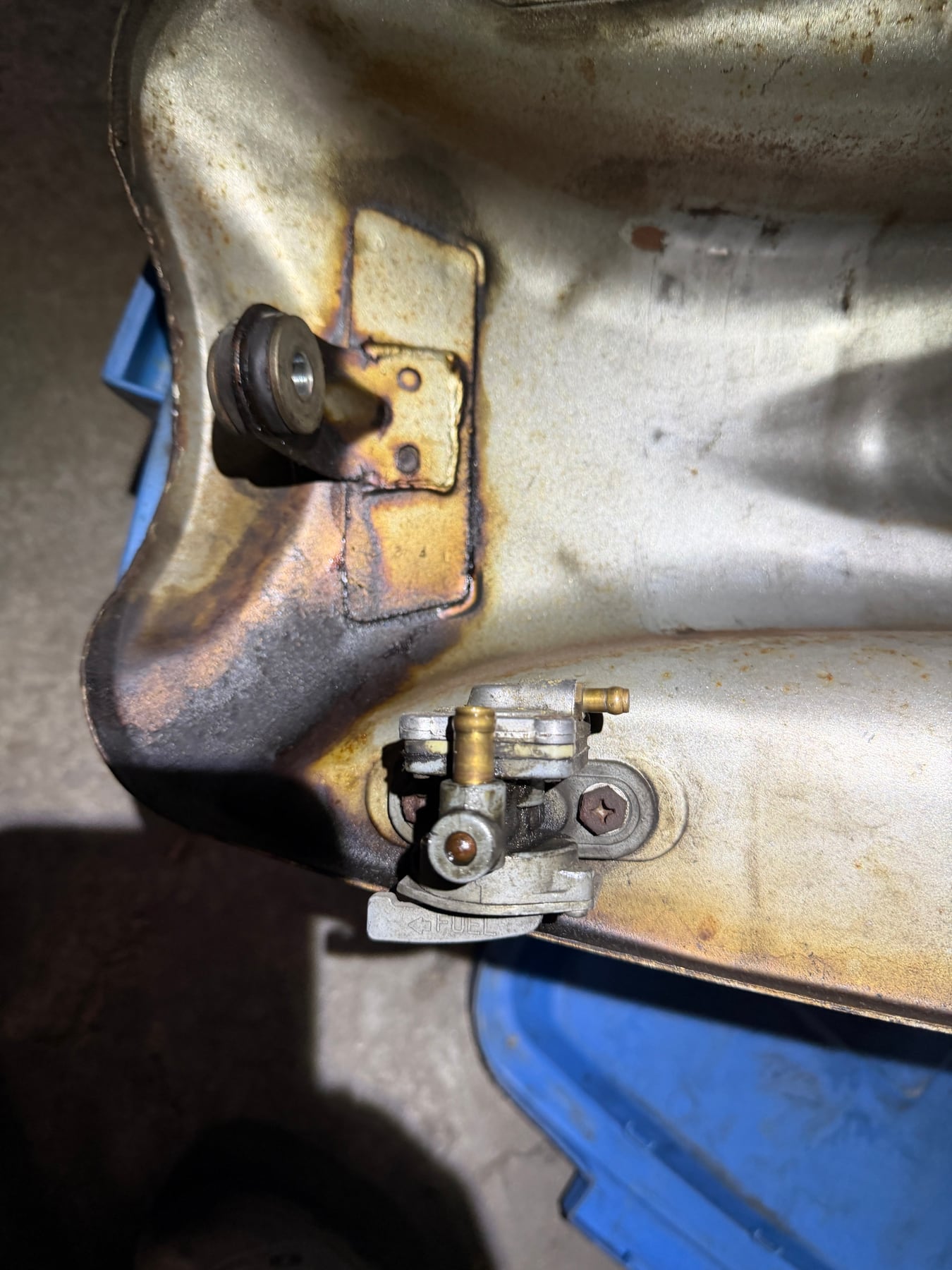 Kawasaki GPZ750 fuel tank petcock inspected after long-term storage