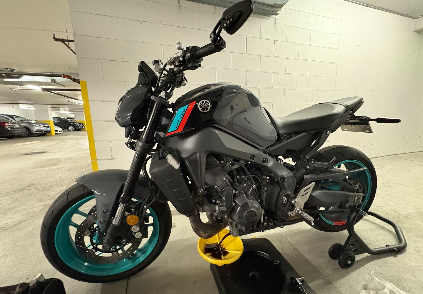 Motorcycle frame and engine mounting area inspected during routine storage maintenance